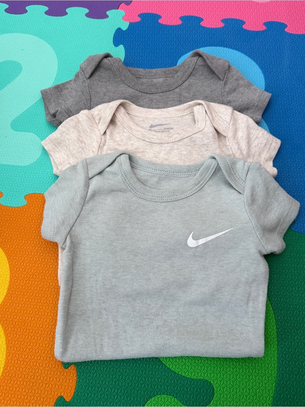 Nike onesies